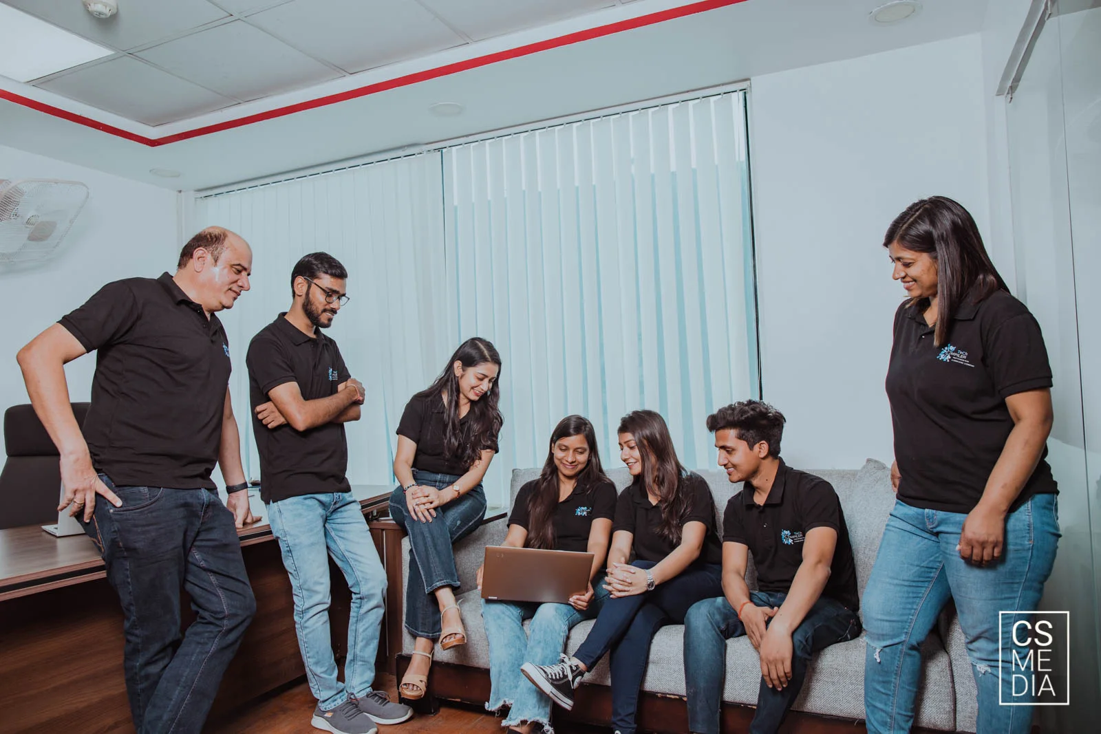 Corporate Lifestyle Photography capturing employees at work in the modern office setting for employer branding.