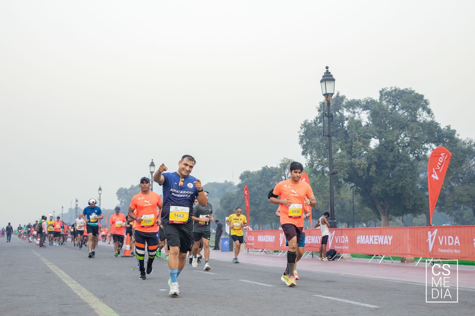 Sports event photography videography Delhi, morning race along India Gate